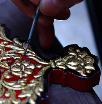 Usta Kala gold-embossed artwork close-up 1