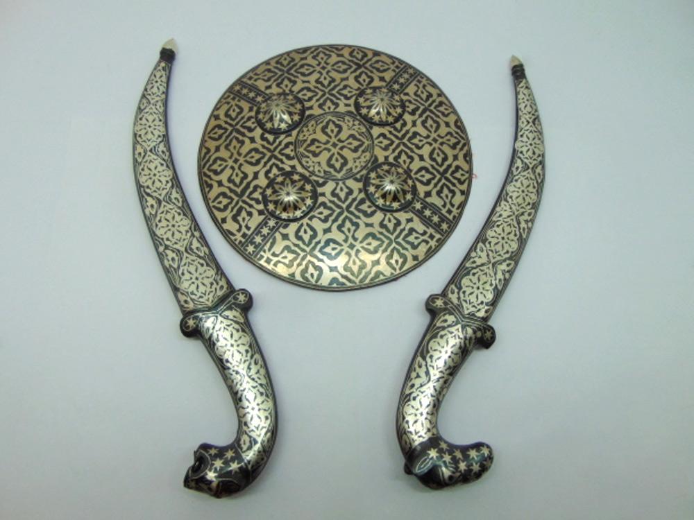 Koftgari inlay on blade with floral scrolls