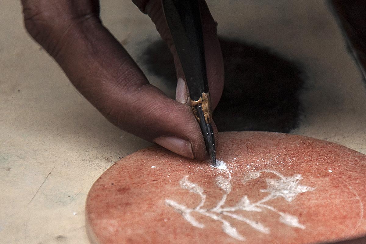 Geometric and arabesque inlay patterns on marble